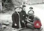 Image of United States troops greeted by French civilians Sainte-Marie-du-Mont France, 1944, second 12 stock footage video 65675060425