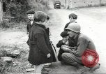 Image of United States troops greeted by French civilians Sainte-Marie-du-Mont France, 1944, second 14 stock footage video 65675060425