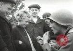 Image of United States troops greeted by French civilians Sainte-Marie-du-Mont France, 1944, second 19 stock footage video 65675060425