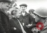 Image of United States troops greeted by French civilians Sainte-Marie-du-Mont France, 1944, second 24 stock footage video 65675060425