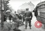 Image of United States troops greeted by French civilians Sainte-Marie-du-Mont France, 1944, second 25 stock footage video 65675060425