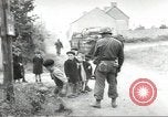 Image of United States troops greeted by French civilians Sainte-Marie-du-Mont France, 1944, second 26 stock footage video 65675060425