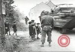 Image of United States troops greeted by French civilians Sainte-Marie-du-Mont France, 1944, second 28 stock footage video 65675060425