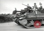 Image of United States troops greeted by French civilians Sainte-Marie-du-Mont France, 1944, second 30 stock footage video 65675060425