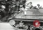 Image of United States troops greeted by French civilians Sainte-Marie-du-Mont France, 1944, second 31 stock footage video 65675060425