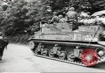 Image of United States troops greeted by French civilians Sainte-Marie-du-Mont France, 1944, second 32 stock footage video 65675060425