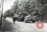 Image of United States troops greeted by French civilians Sainte-Marie-du-Mont France, 1944, second 34 stock footage video 65675060425