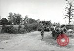 Image of United States troops greeted by French civilians Sainte-Marie-du-Mont France, 1944, second 35 stock footage video 65675060425