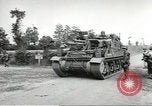 Image of United States troops greeted by French civilians Sainte-Marie-du-Mont France, 1944, second 37 stock footage video 65675060425