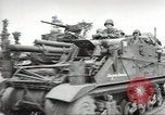 Image of United States troops greeted by French civilians Sainte-Marie-du-Mont France, 1944, second 38 stock footage video 65675060425