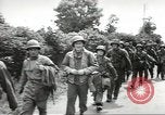Image of United States troops greeted by French civilians Sainte-Marie-du-Mont France, 1944, second 41 stock footage video 65675060425