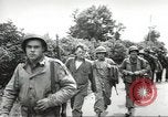 Image of United States troops greeted by French civilians Sainte-Marie-du-Mont France, 1944, second 43 stock footage video 65675060425