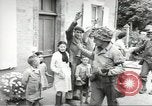 Image of United States troops greeted by French civilians Sainte-Marie-du-Mont France, 1944, second 44 stock footage video 65675060425