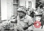 Image of United States troops greeted by French civilians Sainte-Marie-du-Mont France, 1944, second 45 stock footage video 65675060425