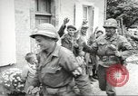 Image of United States troops greeted by French civilians Sainte-Marie-du-Mont France, 1944, second 47 stock footage video 65675060425