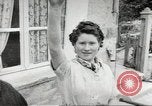 Image of United States troops greeted by French civilians Sainte-Marie-du-Mont France, 1944, second 49 stock footage video 65675060425