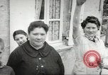 Image of United States troops greeted by French civilians Sainte-Marie-du-Mont France, 1944, second 52 stock footage video 65675060425