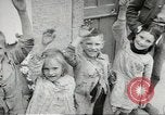 Image of United States troops greeted by French civilians Sainte-Marie-du-Mont France, 1944, second 56 stock footage video 65675060425