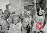 Image of United States troops greeted by French civilians Sainte-Marie-du-Mont France, 1944, second 57 stock footage video 65675060425