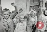 Image of United States troops greeted by French civilians Sainte-Marie-du-Mont France, 1944, second 59 stock footage video 65675060425