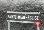 Image of American soldiers enter Sainte-Mere-Eglise in World War II Normandy France, 1944, second 1 stock footage video 65675060426