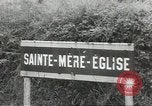 Image of American soldiers enter Sainte-Mere-Eglise in World War II Normandy France, 1944, second 4 stock footage video 65675060426