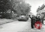 Image of American soldiers enter Sainte-Mere-Eglise in World War II Normandy France, 1944, second 7 stock footage video 65675060426