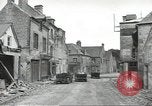 Image of American soldiers enter Sainte-Mere-Eglise in World War II Normandy France, 1944, second 9 stock footage video 65675060426