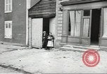 Image of American soldiers enter Sainte-Mere-Eglise in World War II Normandy France, 1944, second 15 stock footage video 65675060426