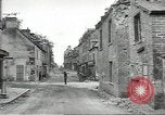 Image of American soldiers enter Sainte-Mere-Eglise in World War II Normandy France, 1944, second 18 stock footage video 65675060426