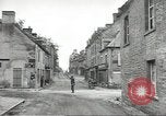 Image of American soldiers enter Sainte-Mere-Eglise in World War II Normandy France, 1944, second 20 stock footage video 65675060426