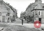Image of American soldiers enter Sainte-Mere-Eglise in World War II Normandy France, 1944, second 22 stock footage video 65675060426