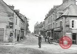 Image of American soldiers enter Sainte-Mere-Eglise in World War II Normandy France, 1944, second 23 stock footage video 65675060426