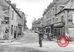 Image of American soldiers enter Sainte-Mere-Eglise in World War II Normandy France, 1944, second 24 stock footage video 65675060426