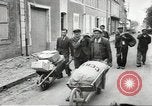 Image of American soldiers enter Sainte-Mere-Eglise in World War II Normandy France, 1944, second 28 stock footage video 65675060426