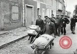 Image of American soldiers enter Sainte-Mere-Eglise in World War II Normandy France, 1944, second 30 stock footage video 65675060426