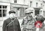 Image of American soldiers enter Sainte-Mere-Eglise in World War II Normandy France, 1944, second 32 stock footage video 65675060426