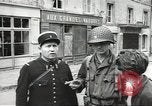 Image of American soldiers enter Sainte-Mere-Eglise in World War II Normandy France, 1944, second 35 stock footage video 65675060426