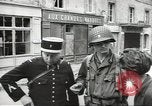 Image of American soldiers enter Sainte-Mere-Eglise in World War II Normandy France, 1944, second 36 stock footage video 65675060426