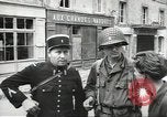 Image of American soldiers enter Sainte-Mere-Eglise in World War II Normandy France, 1944, second 37 stock footage video 65675060426