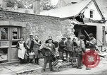 Image of American soldiers enter Sainte-Mere-Eglise in World War II Normandy France, 1944, second 38 stock footage video 65675060426
