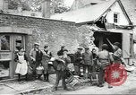 Image of American soldiers enter Sainte-Mere-Eglise in World War II Normandy France, 1944, second 39 stock footage video 65675060426
