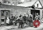 Image of American soldiers enter Sainte-Mere-Eglise in World War II Normandy France, 1944, second 41 stock footage video 65675060426