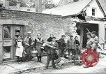 Image of American soldiers enter Sainte-Mere-Eglise in World War II Normandy France, 1944, second 42 stock footage video 65675060426