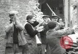 Image of American soldiers enter Sainte-Mere-Eglise in World War II Normandy France, 1944, second 47 stock footage video 65675060426