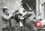 Image of American soldiers enter Sainte-Mere-Eglise in World War II Normandy France, 1944, second 48 stock footage video 65675060426