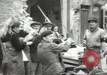 Image of American soldiers enter Sainte-Mere-Eglise in World War II Normandy France, 1944, second 50 stock footage video 65675060426
