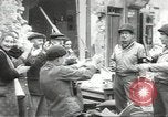 Image of American soldiers enter Sainte-Mere-Eglise in World War II Normandy France, 1944, second 51 stock footage video 65675060426