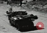 Image of Evacuating wounded United States soldiers from Omaha Beach Normandy France, 1944, second 8 stock footage video 65675060432