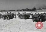 Image of Evacuating wounded United States soldiers from Omaha Beach Normandy France, 1944, second 33 stock footage video 65675060432